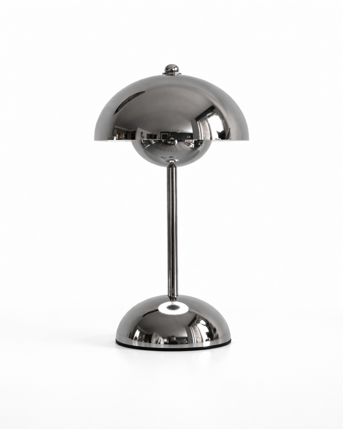 Chrome table lamp on a white background
